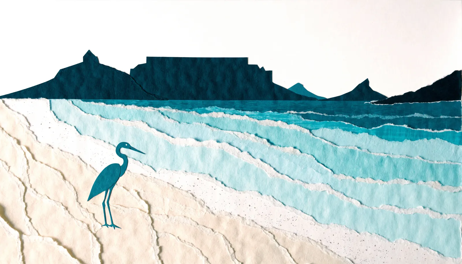 Torn-paper collage of Table Mountain across the bay, turquoise surf on cream sand, with a heron on the shore